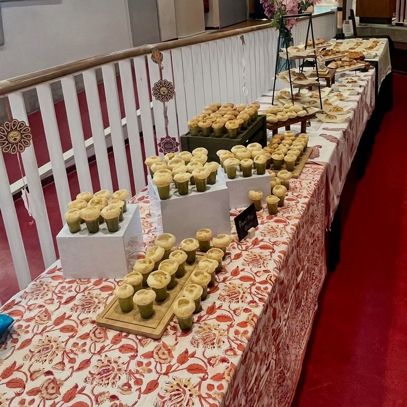 Long grazing table set for a retirement party
